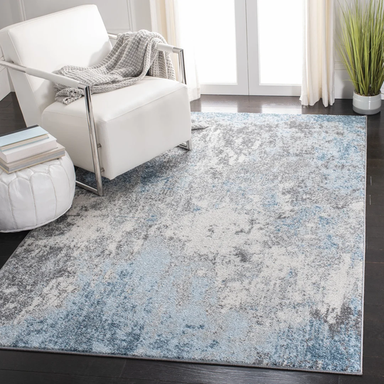 Corine Looped/Hooked Blue Rug