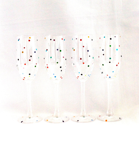 A Set Of Four Smartie Dot Champagne Glasses