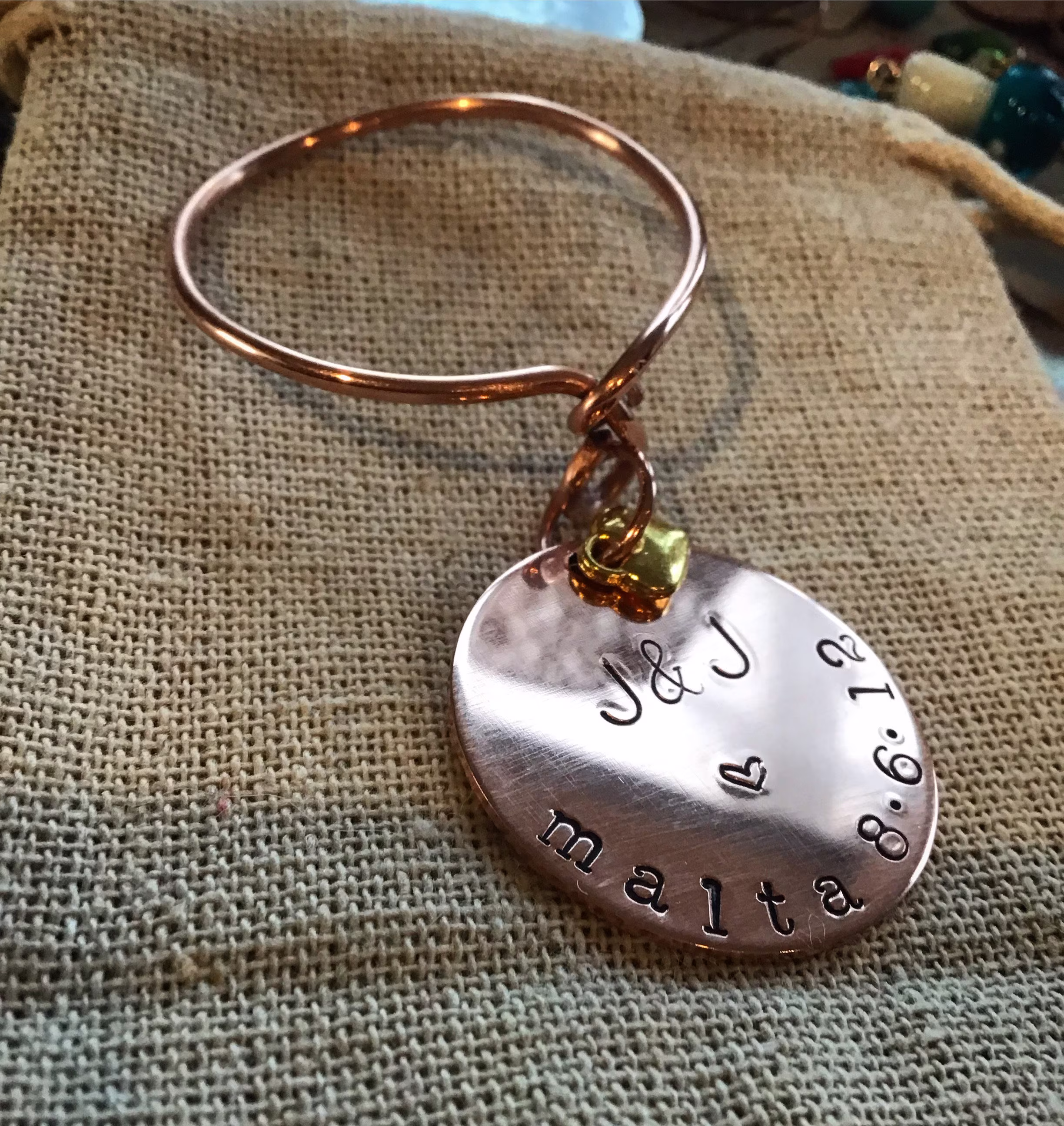 A Personalised Wine/Champagne/Beer Bottle Charm in Copper. Finished On Hand Sculpted, Repurposed, Copper Wire With A Choice Of