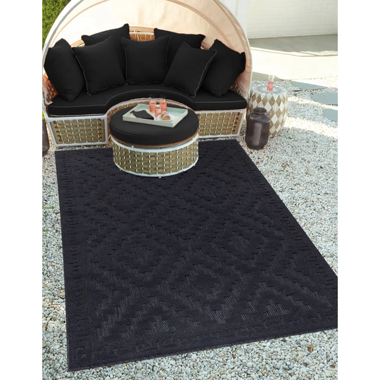 Irizarry Machine Woven Polypropylene Black Rug