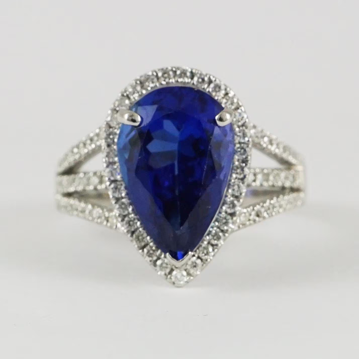 Gemstone 3.9 Ct Pear Cut Blue Sapphire, 14K White Gold, Glamorous Sapphire & Halo Diamond Ring, Three Shank Wedding Party Wear Ring