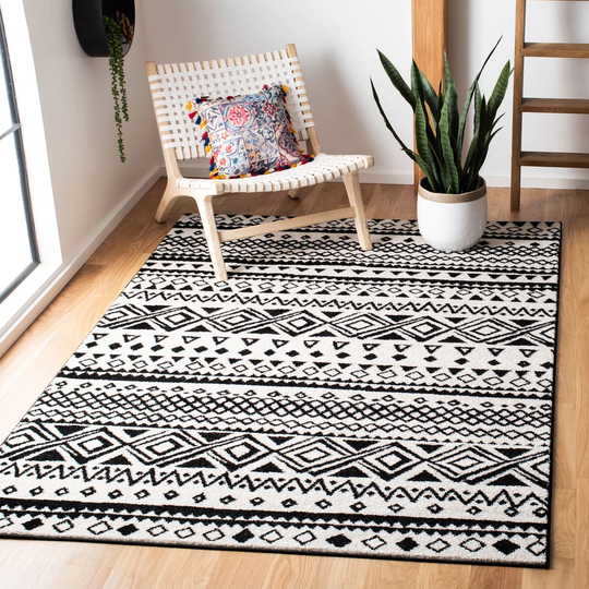 Swiney Looped/Hooked Ivory Rug
