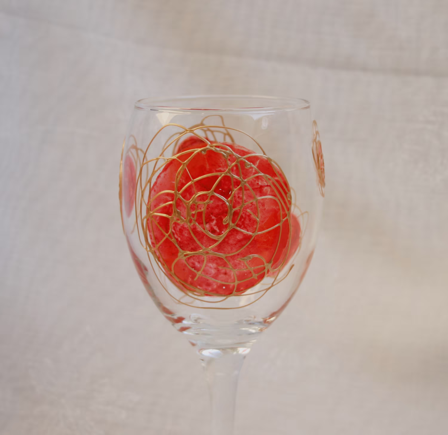 Galaxy - Red & Gold An Exclusive Design, Hand Painted, Wine Glass Featuring Red "Planets' Swirled With Raised Gold