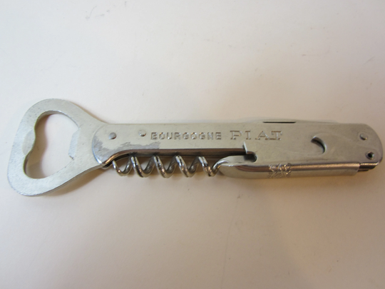 A Superb Vintage Bourgone Metal Bottle Opener & Corkscrew