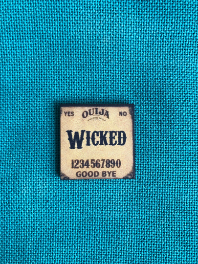 Wicked Wooden Needle Minder | Cover