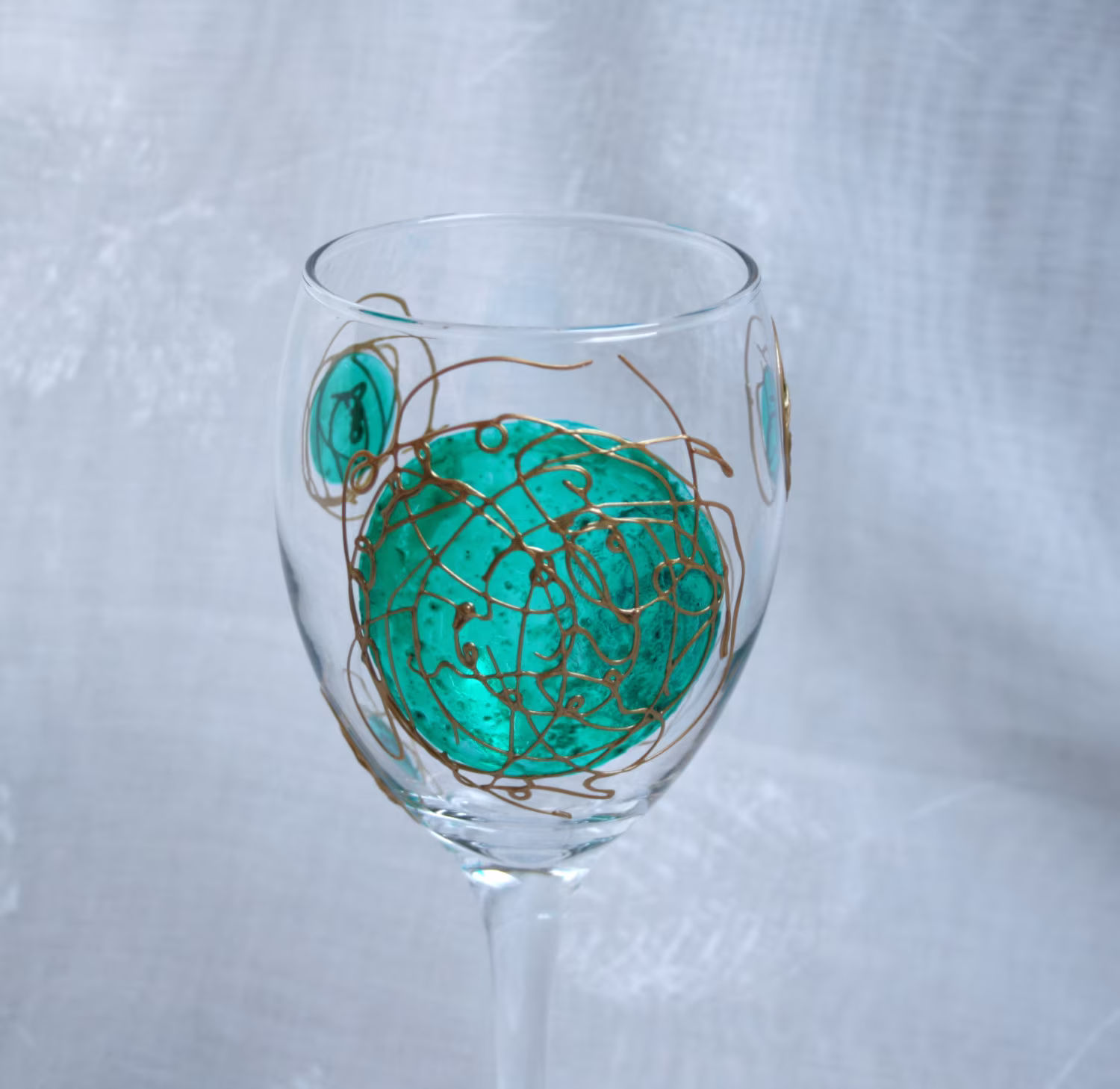 Galaxy - Green & Gold An Exclusive Design, Hand Painted, Wine Glass Featuring Green "Planets' Swirled With Raised Gold