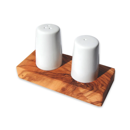 Salt and pepper shakers made of ceramic on an olive wood base